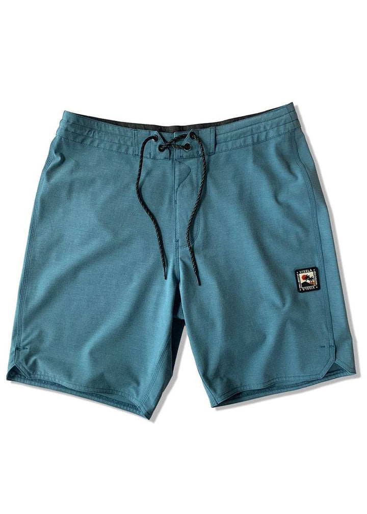 Vissla Solid Sets 18.5-inch boardshort in tidal blue, front view.