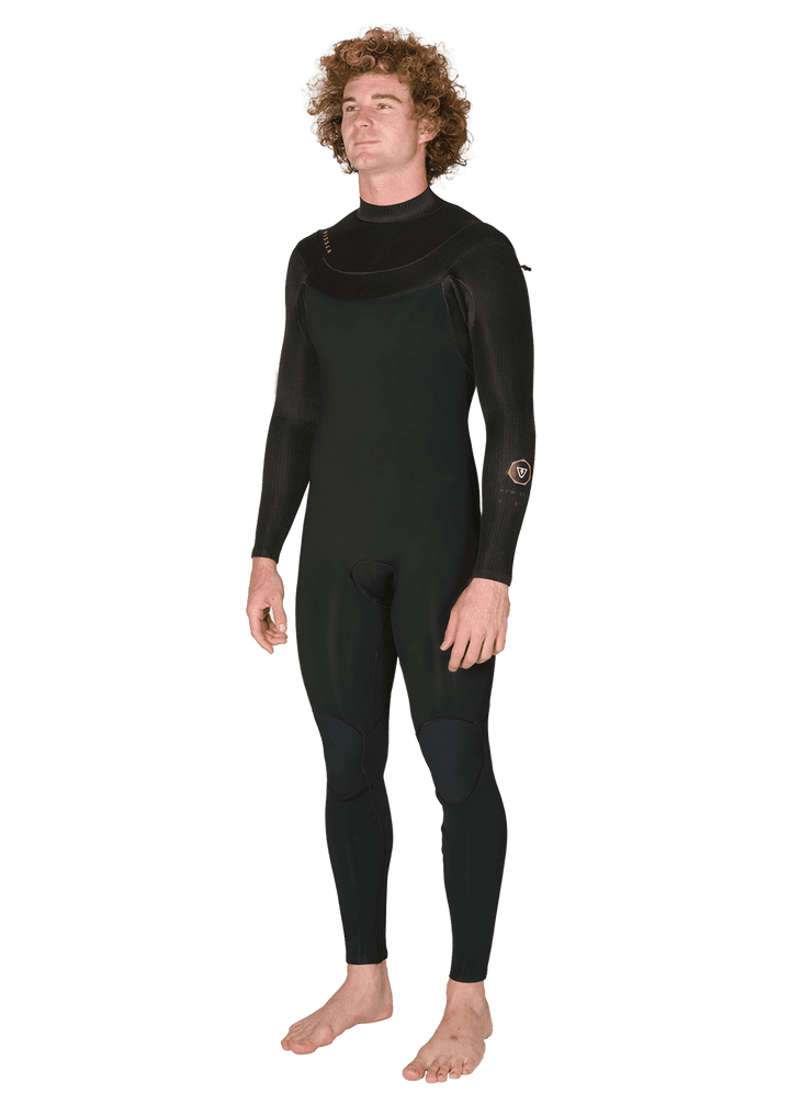 Vissla New Seas 5-4 U-Zip Wetsuit in black, front-side angle view.