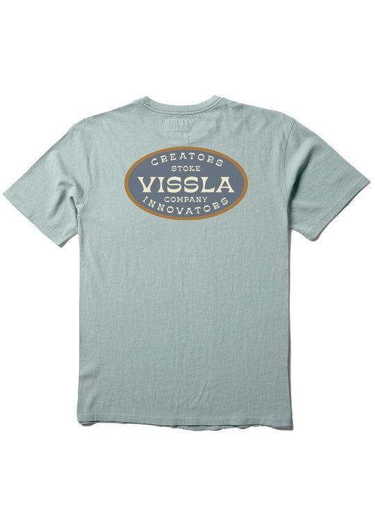 Vissla Buckled Tee in Agave green with back screen print featuring 'Creators Stoke Company Innovators' design. Modern fit, 100% cotton.